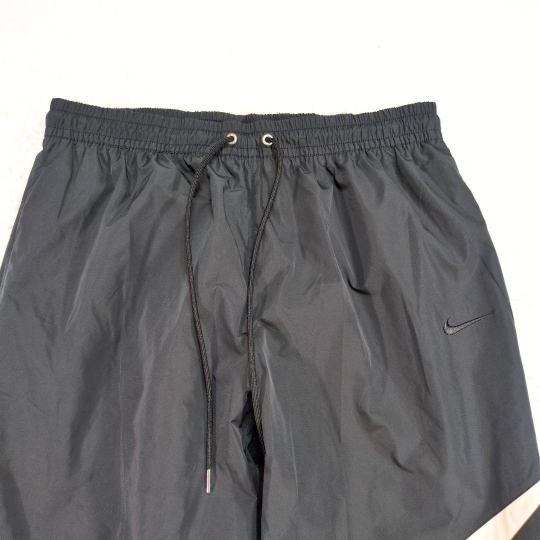 新品　タグ付未使用品✨️ナイキ　トラックパンツ　ナイロン　黒　XL　6086