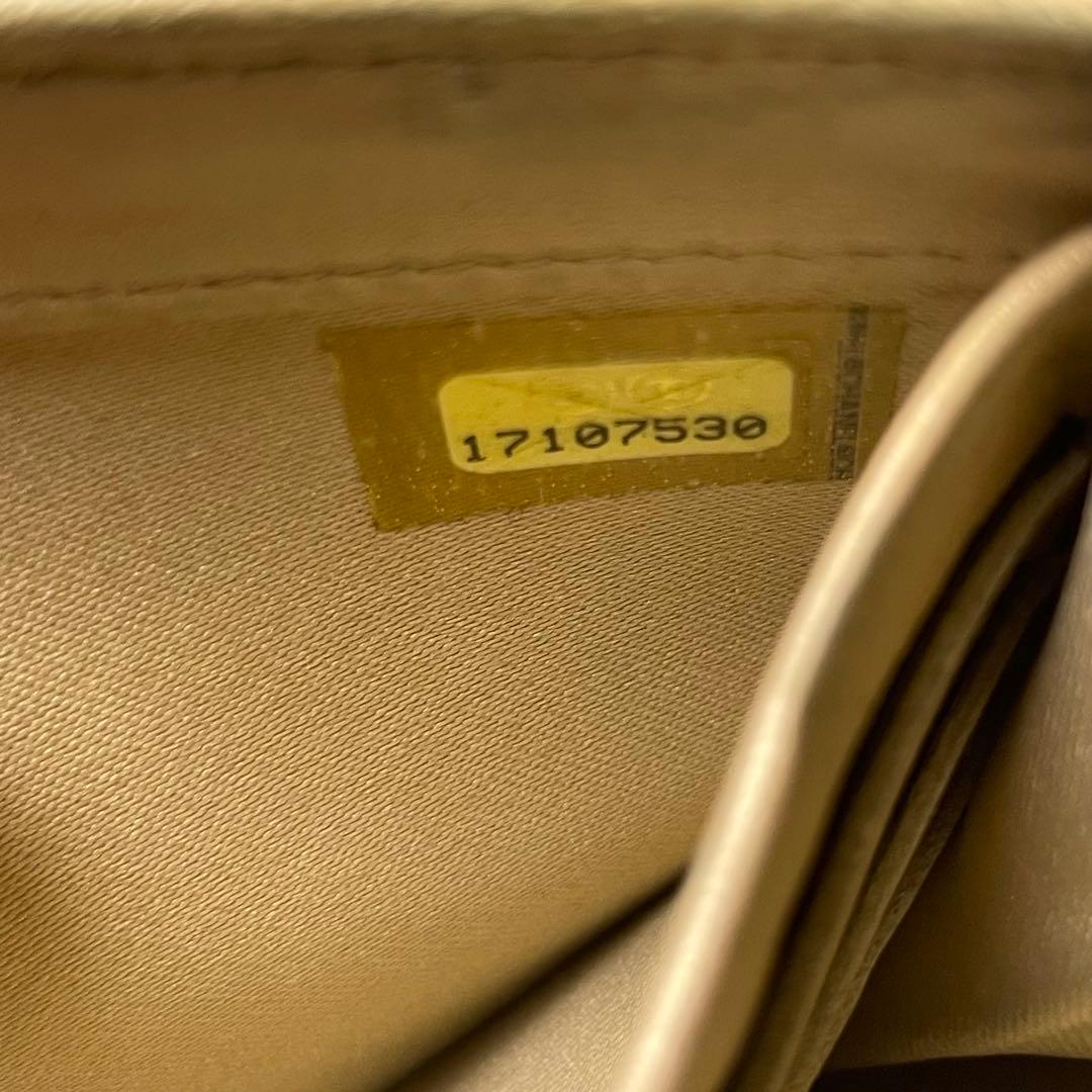 CHANEL カメリア レザー 二つ折り 長財布 シール有