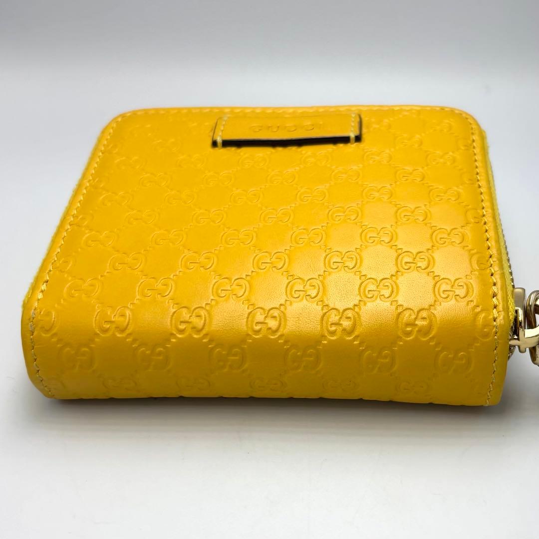 【美品】GUCCI グッチ 二つ折り財布 シグネチャー イエローレザーレディース