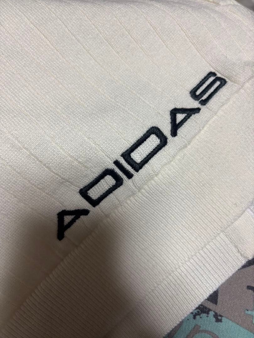 マ*助様 【新品・定価2.3万】アディダスゴルフ ADICROSS 中綿カーディ