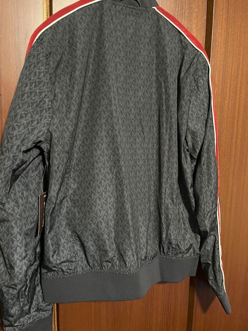 正規品マイケルコース 柄ブルゾン袖ライン　大きめ 定価¥81,400 未使用 黒