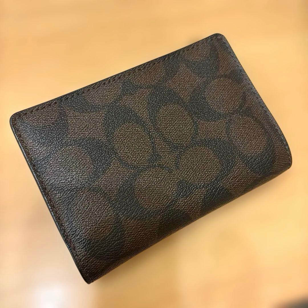 正規品 COACH 二つ折り財布 ブラウン ブラック シグネチャー