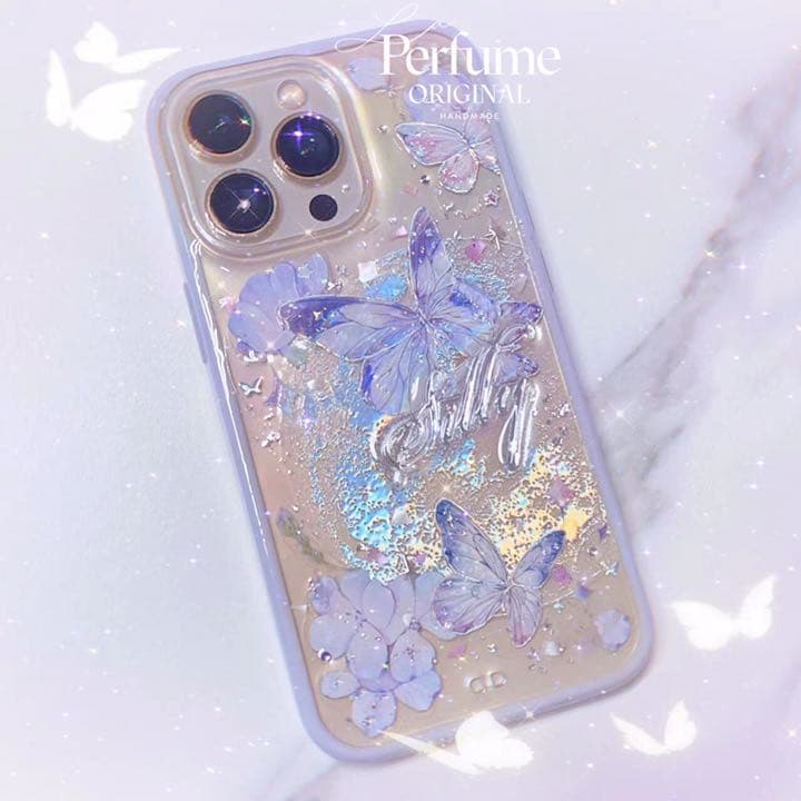 バタフライ✨名入れ♡キラキラ✨レインボー 花 イニシャル フチiPhoneケース